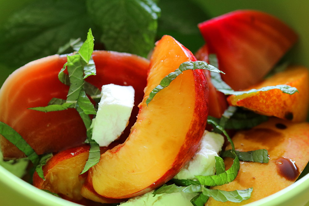 Roasted Beet and Nectarine Salad in a lime green bowl