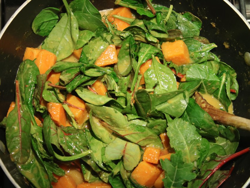 Sweet Potatoes and Bitter Greens in a skillet