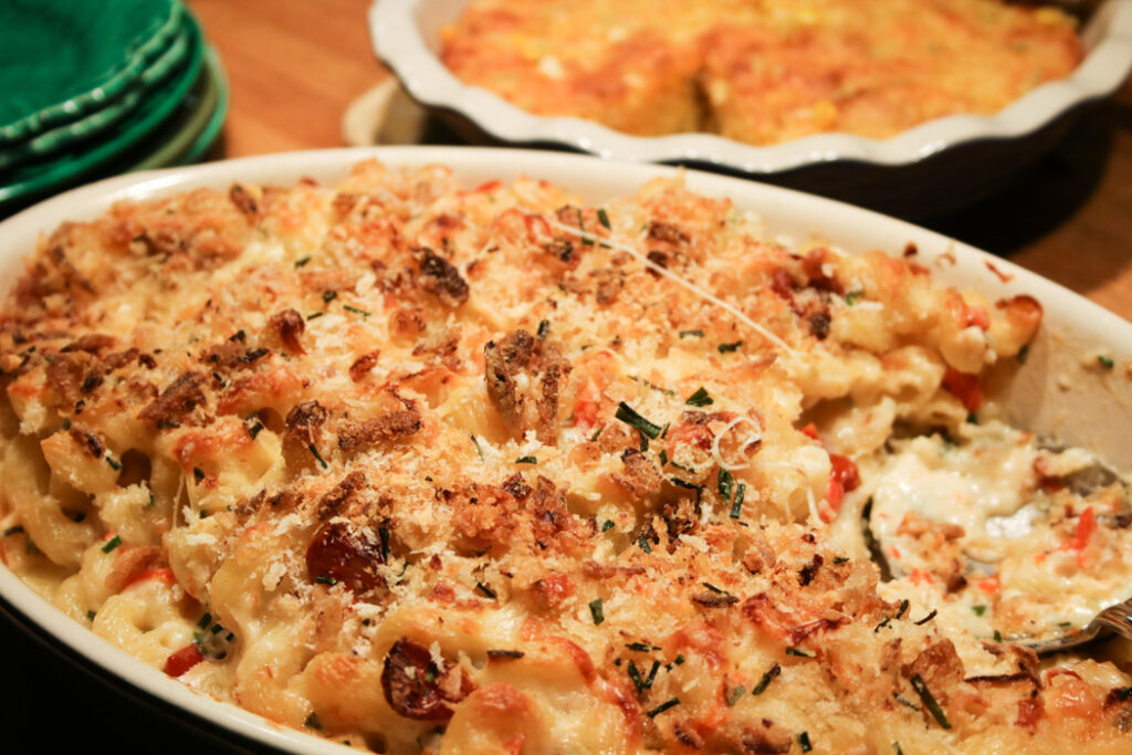 Mac & Cheese Southern Style - in an oval casserole with panko crust, and pimento cheese sauce