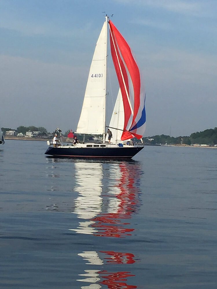 Smooth as Glass - sail boat with spinaker