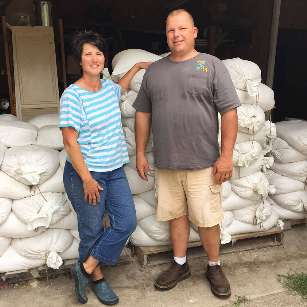 Tracy and Brad Wise with the feed bags