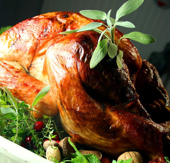 Roast Turkey Perfection with herb garnish