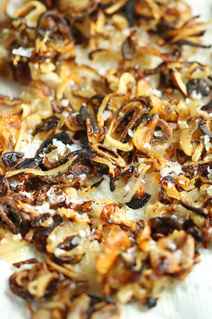 Sheet pan of Crispy Shallots with sea salt