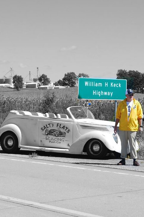William H Keck Highway sign with Richard Keck and Salty Flats vintage car