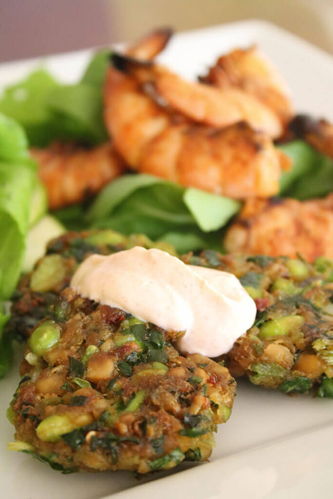 Edamame & Chickpea Fritters with shrimp in the background