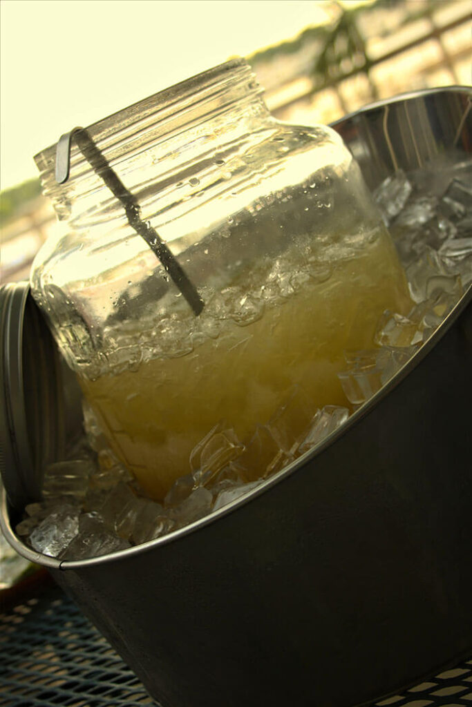 Margaritas in a large jar