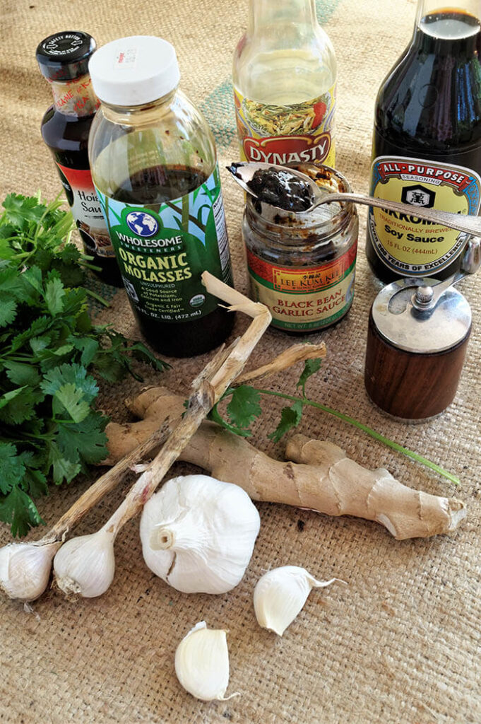 Asian Marinade Ingredients including cilantro, garlic, ginger, molasses, soy, black bean garlic paste, sesame oil
