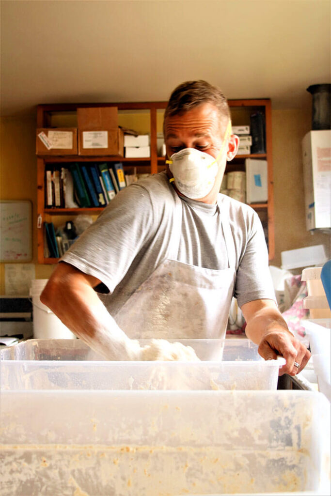 Charlie Mixing the sourdough by hand