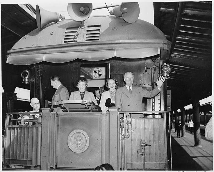 Harry Truman on the back of a train