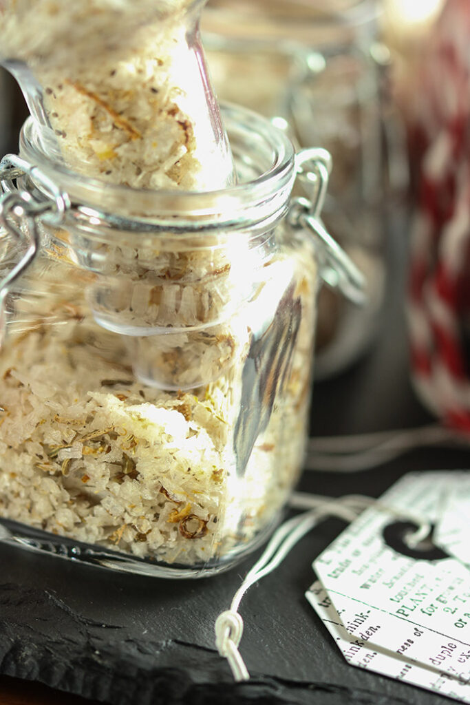 close up of the jar being filled with citrus salt