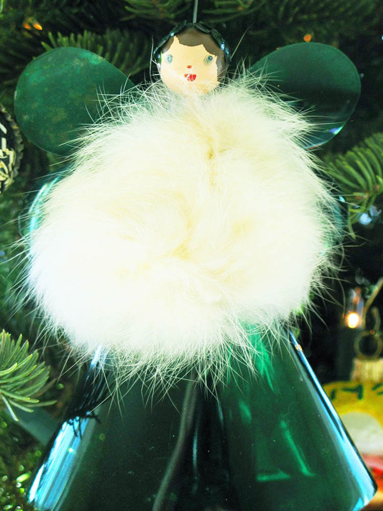 katy angel christmas ornament from the 1950s - green wings, white fur body and wooden head