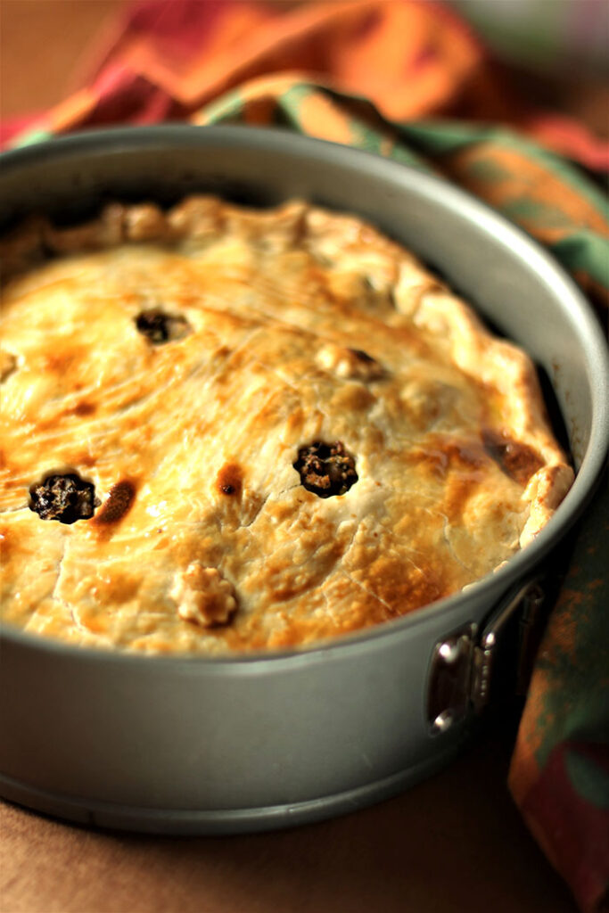 Horseradish Meat Pie in a spring form pan