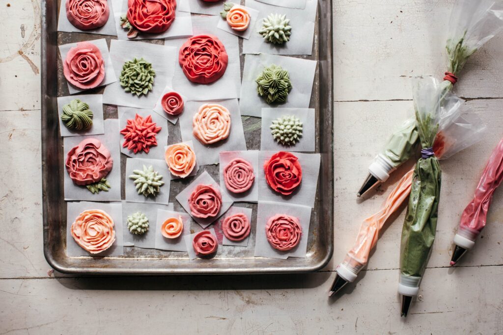 My Name is Yeh: work in progress - making the pink, coral, green flowers to top the rose rose cake