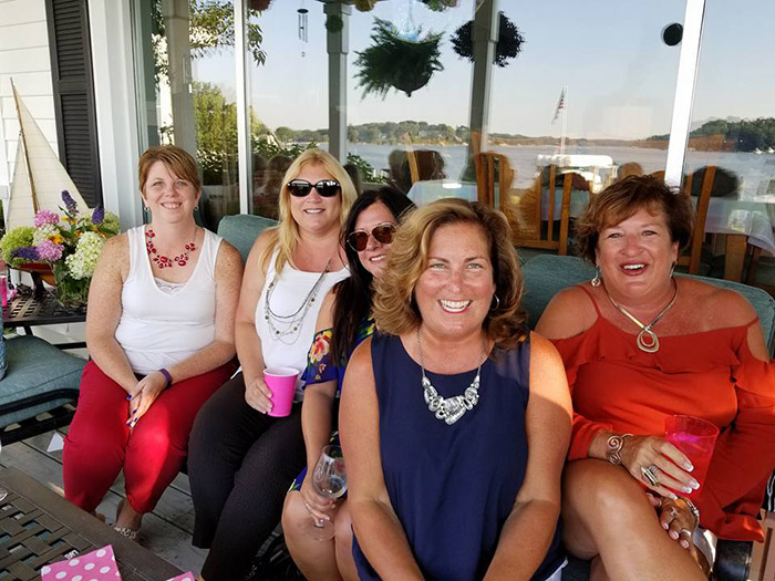five ladies who lunch, sitting on the porch looking at the lake
