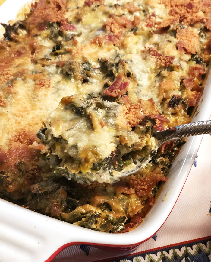Casserole of rainbow chard and leek gratin, with spoon out