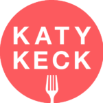 Katy Keck logo Coral circle with a fork