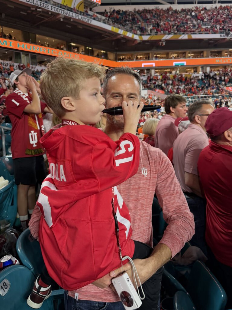 Dad and son in red represent Hoosier Nation at the National Football Champtionship. Tonette for the win. 